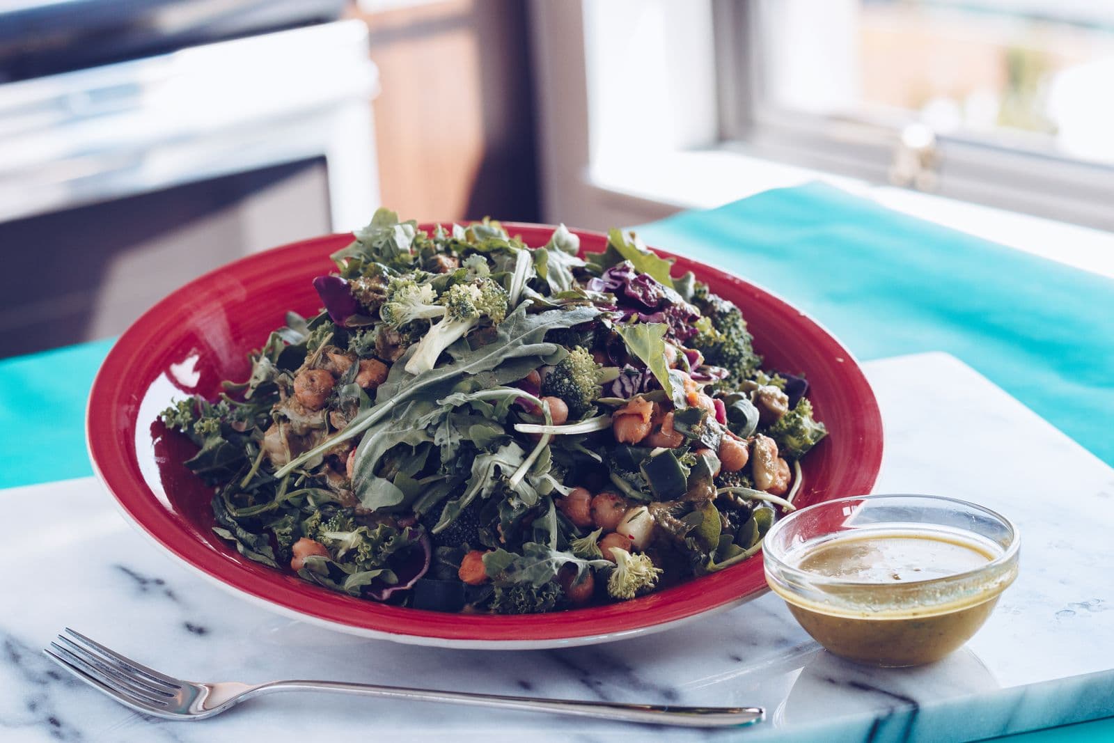 Colorful nourishing bowl with vegetables on a table